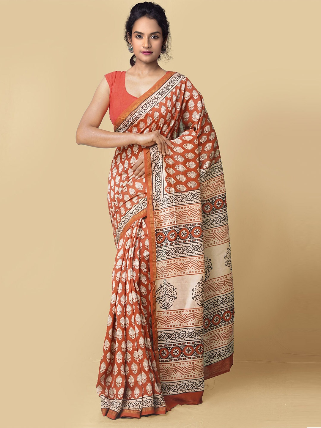 

Unnati Silks Red & Beige Floral Silk Cotton Chanderi Saree