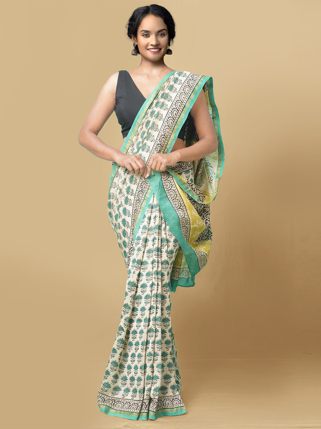 

Unnati Silks Women Beige & Teal Pure Preet Bagru Chanderi Sico Saree