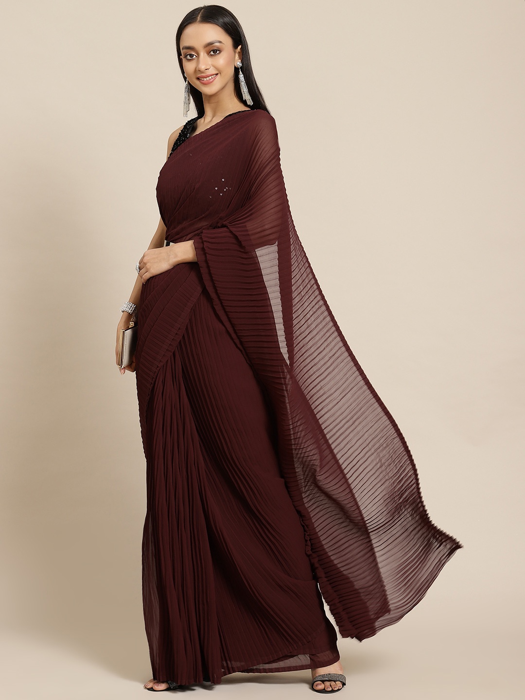 

Tikhi Imli Maroon Pleated Georgette Saree