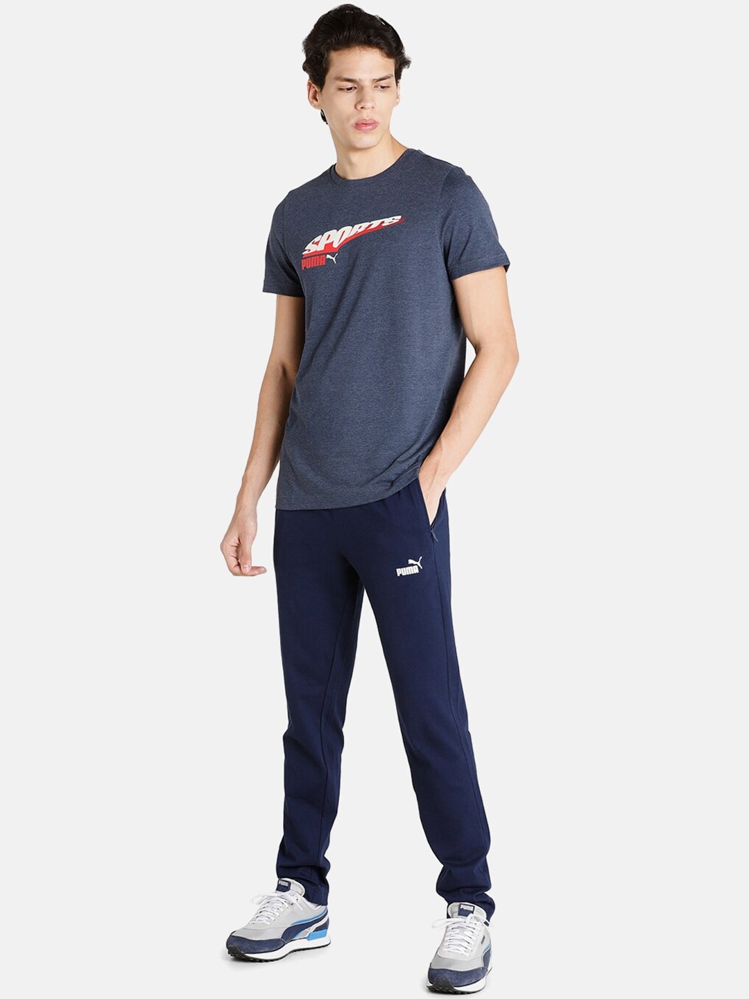 

Puma Men Blue Solid Zippered Jersey Track Pants