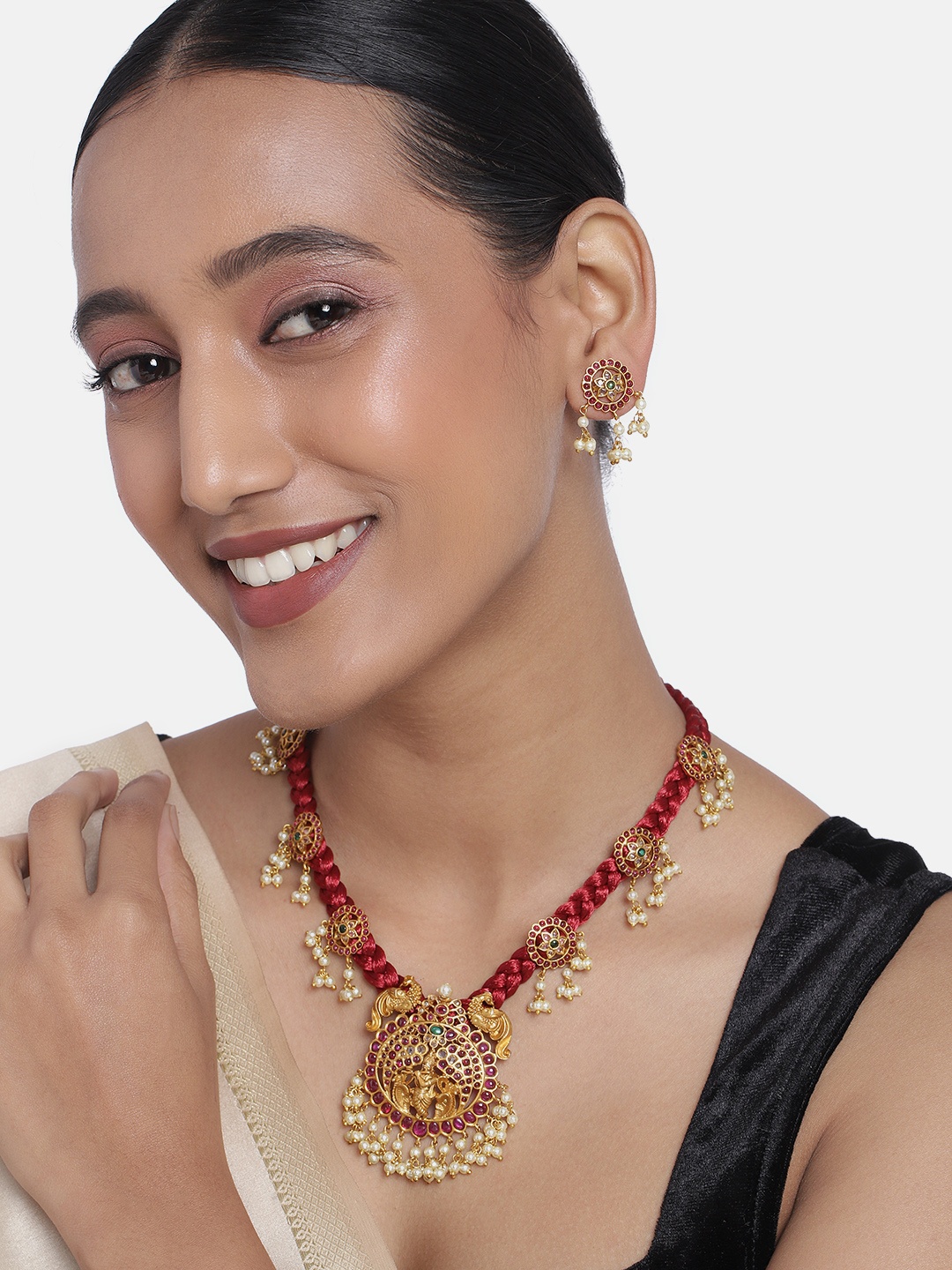 

Peora Matte Gold Finish Red Cotton Dori Jewellery Set