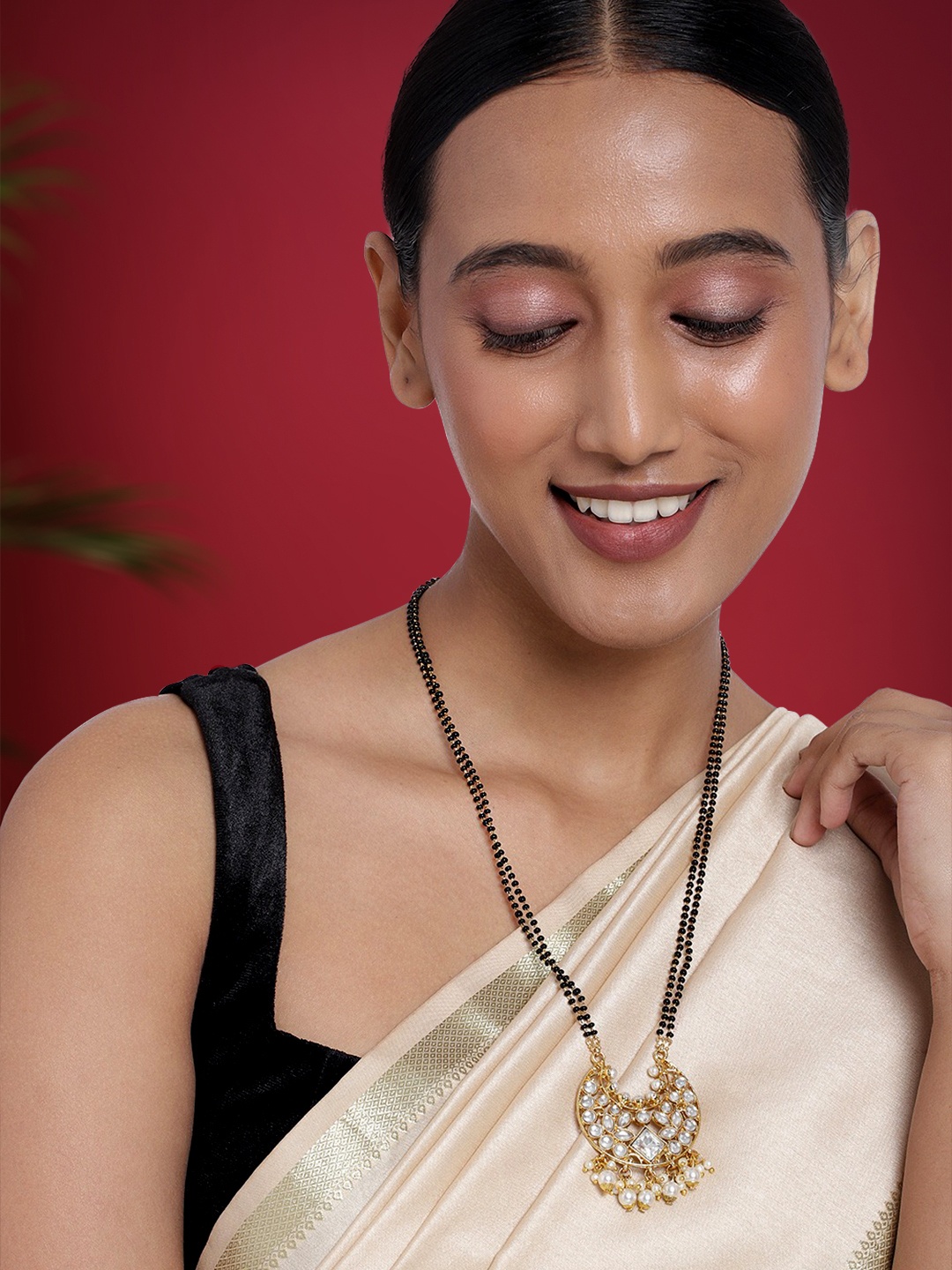 

Peora Gold Plated & White Kundan Beaded Mangalsutra