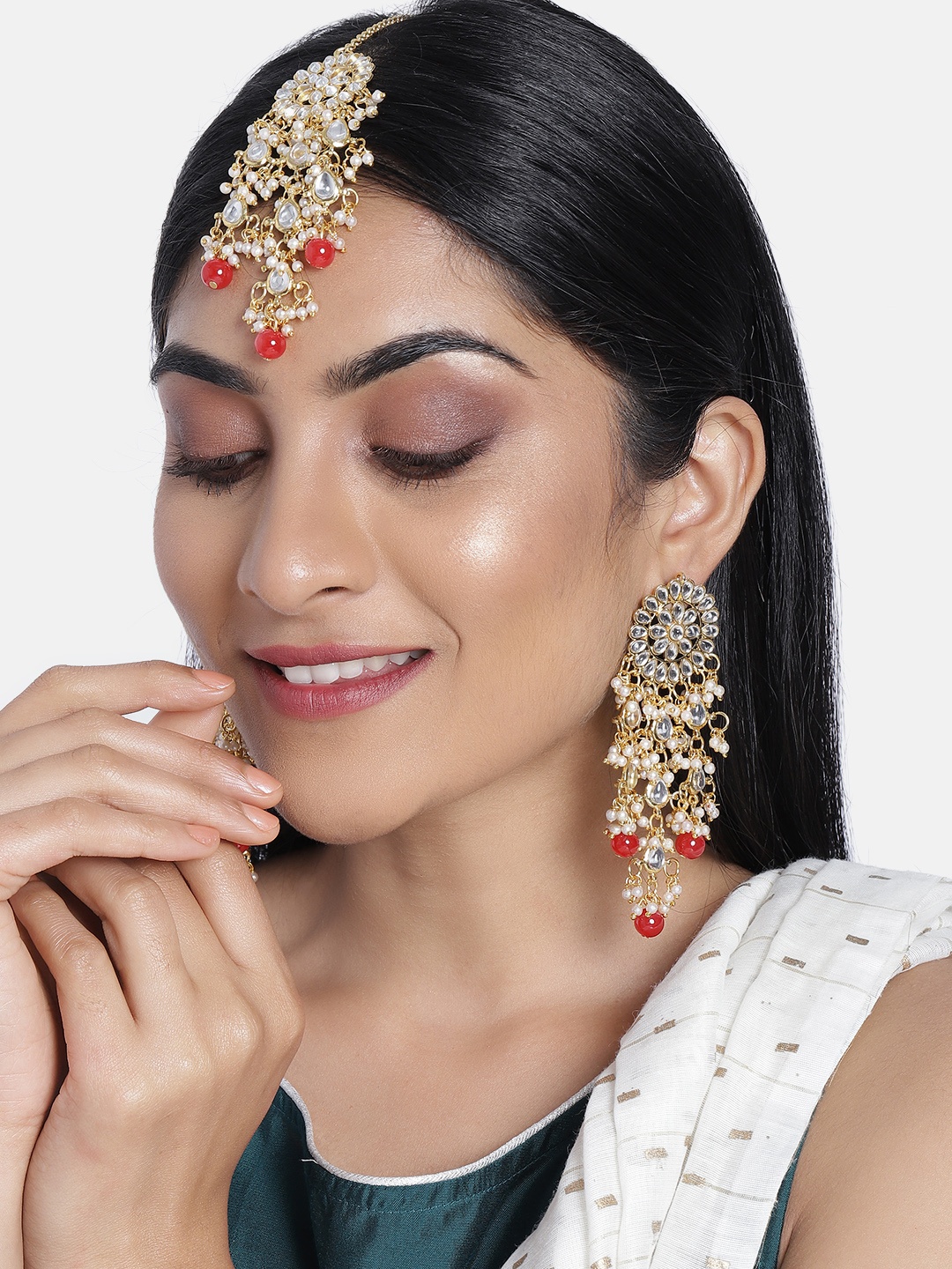 

Peora Red Gold Plated Kundan Studded Beaded Classic Drop Earrings & Maang Tika