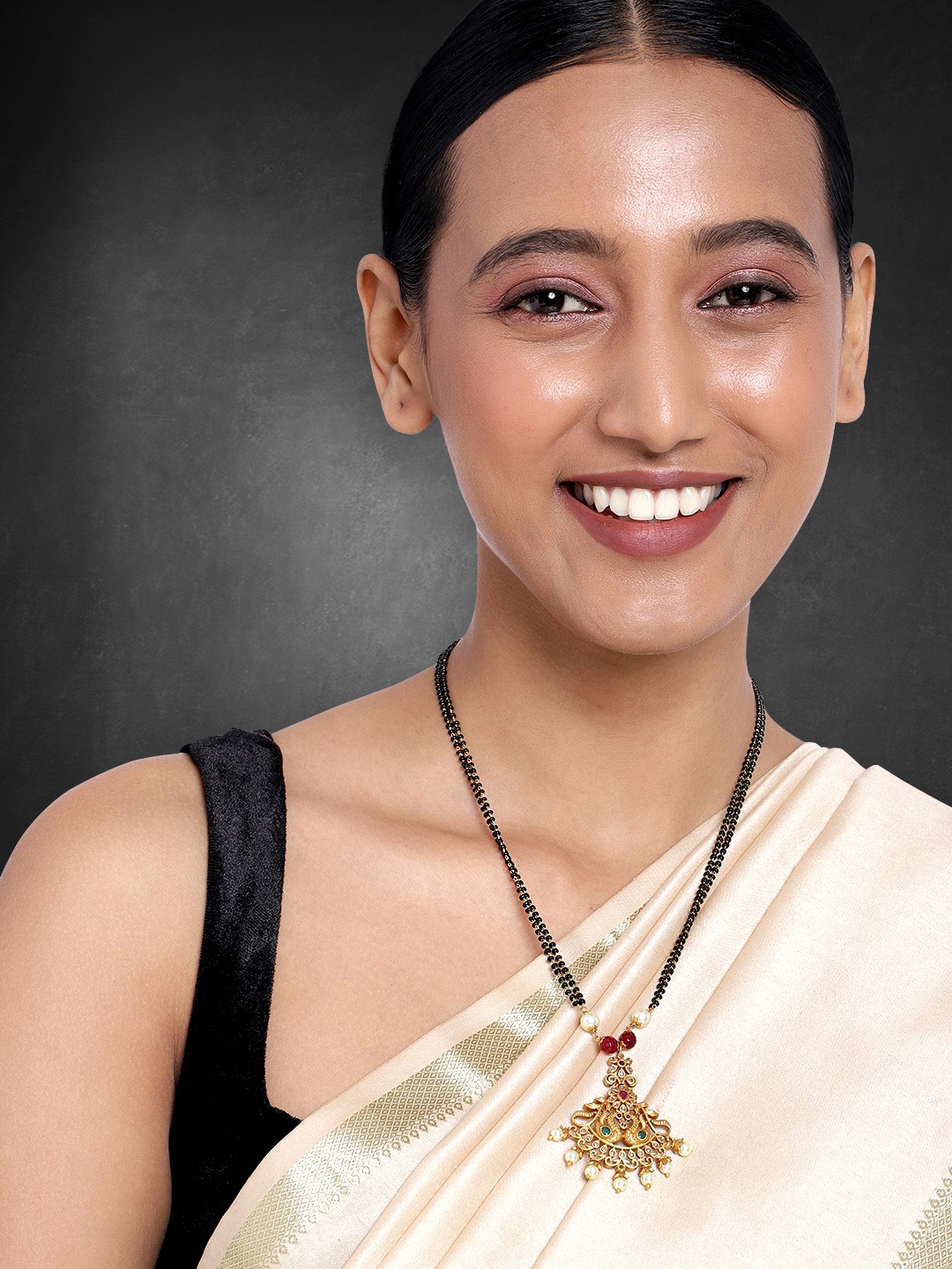 

Peora Gold Plated & Red Kundan Beaded Mangalsutra