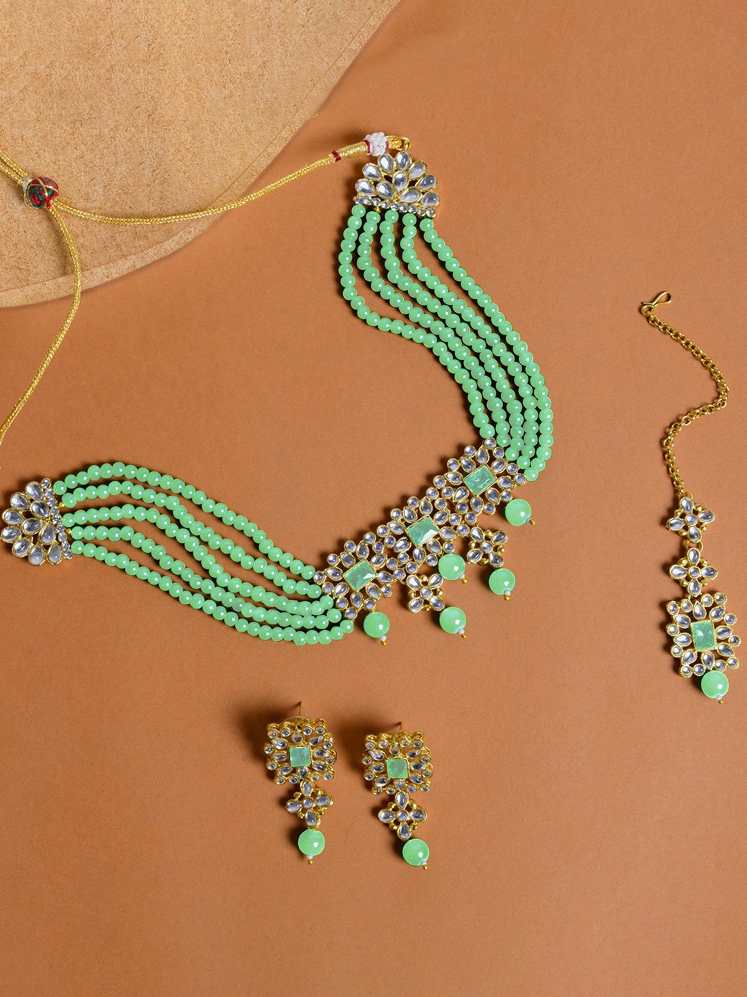 

Peora Sea Green & White Gold-Plated Kundan & Pearls Jewellery Set