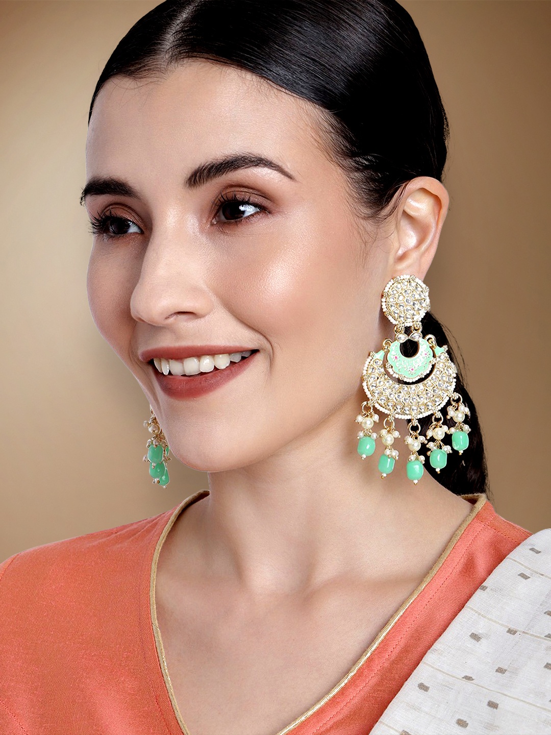 

Peora Sea Green & White Gold Plated Crescent Shaped Kundan & Pearls Chandbalis