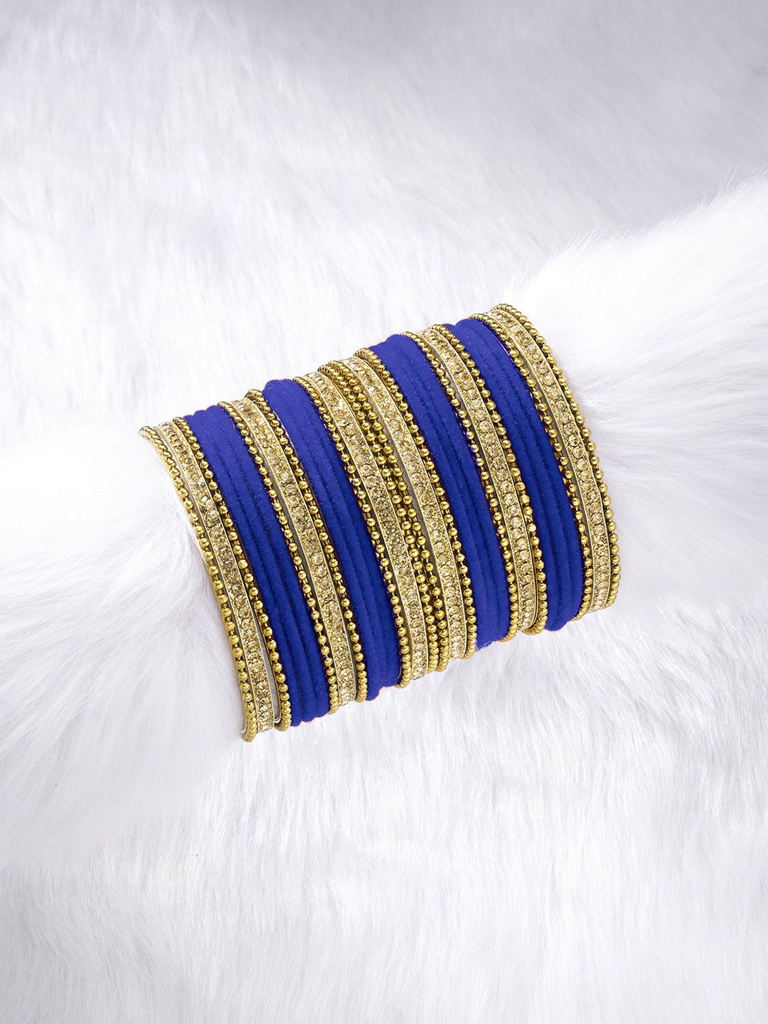 

Peora Set of 30 Blue Gold Plated Velvet Chuda Bangles