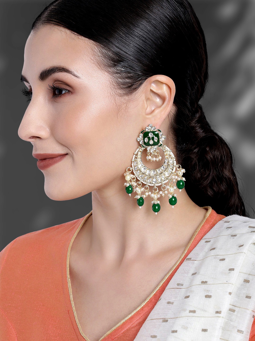 

Peora Green & White Gold Plated Crescent Shaped Meena Work Hand Made Kundan Chandbalis