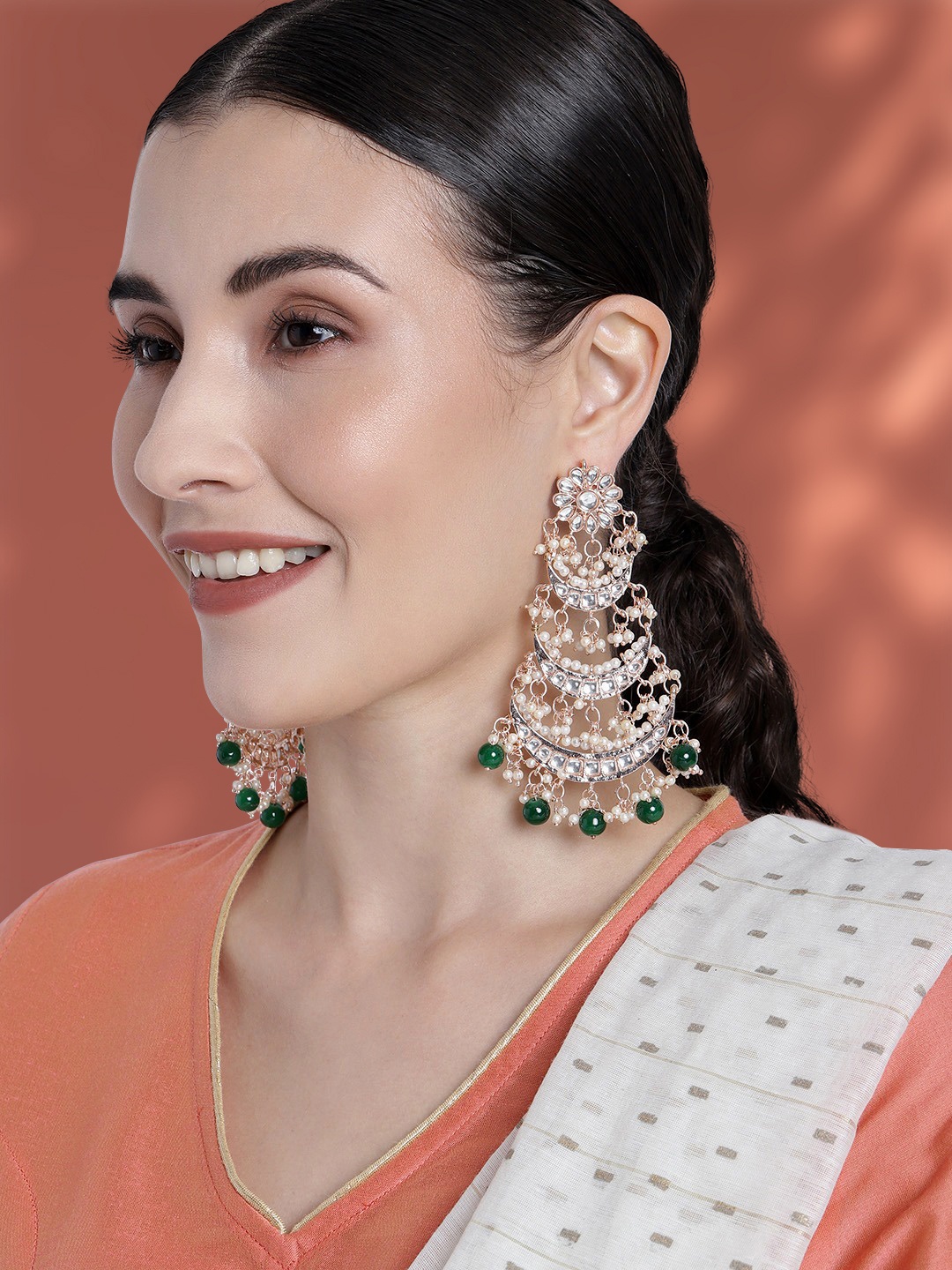 

Peora Green & White Gold Plated Crescent Shaped Chandbalis