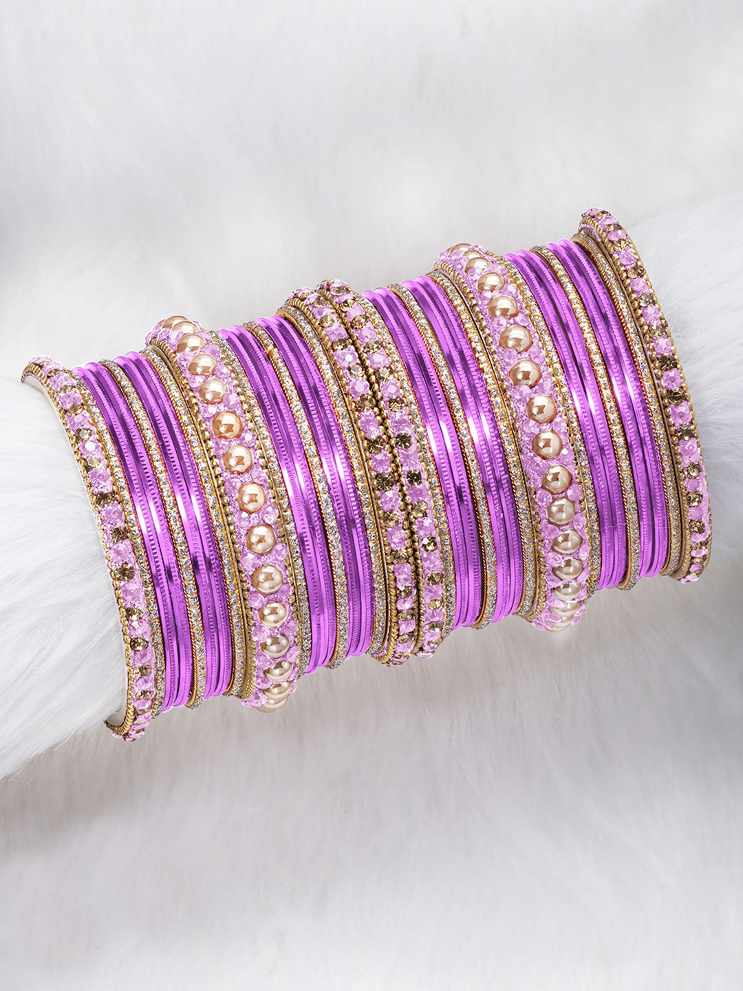 

Peora Set of 34 Pink Gold Plated Metal Chuda Bangles