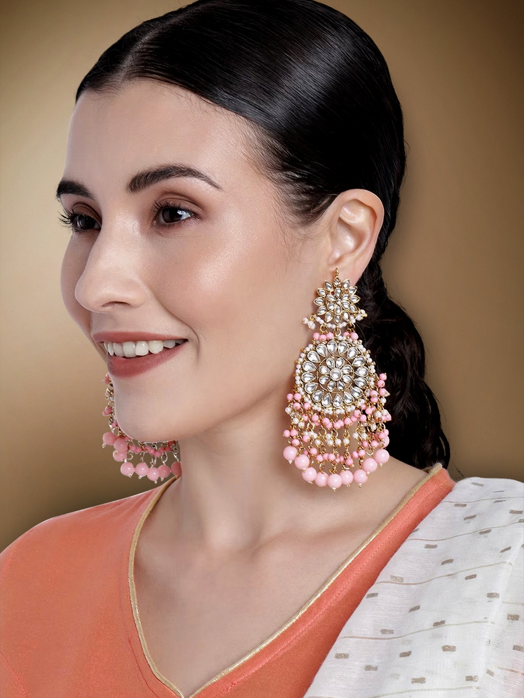 

Peora Pink & White Gold Plated Crescent Shaped Kundan Chandbalis