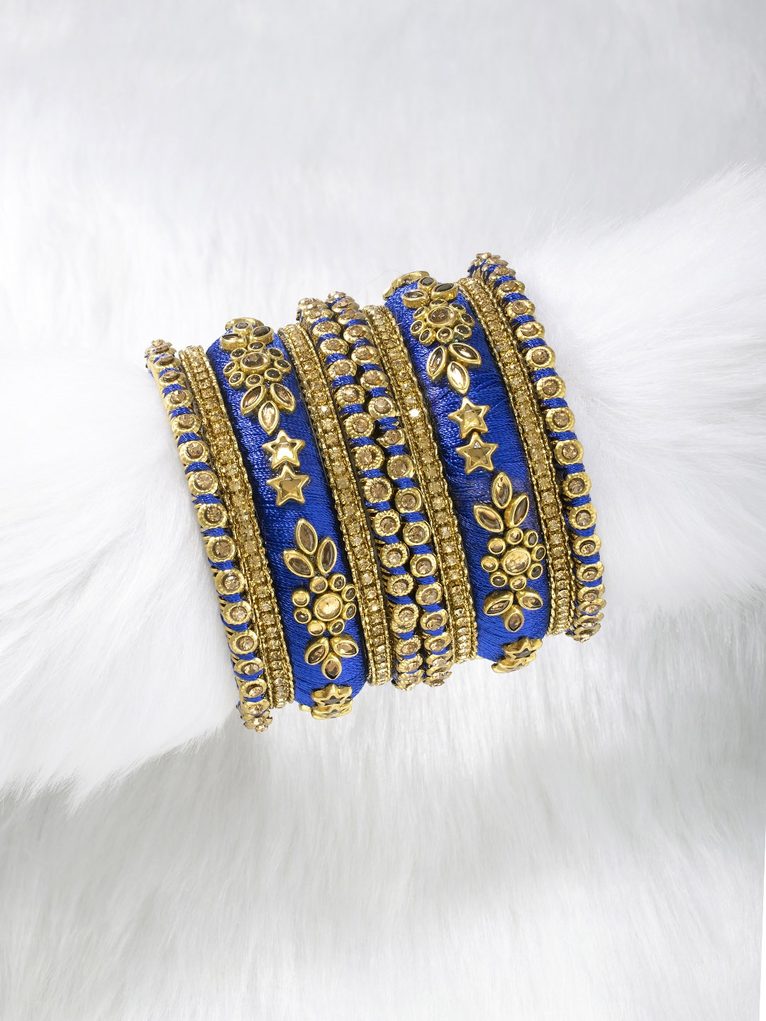 

Peora Set of 10 Blue Handcrafted Silk Thread Kundan Studded Floral Chuda Bangles