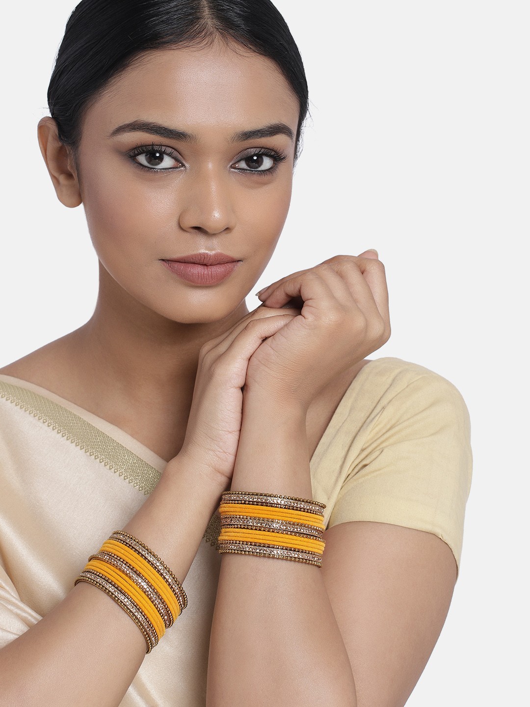 

Peora Set of 30 Yellow Gold Plated Velvet Chuda Bangles