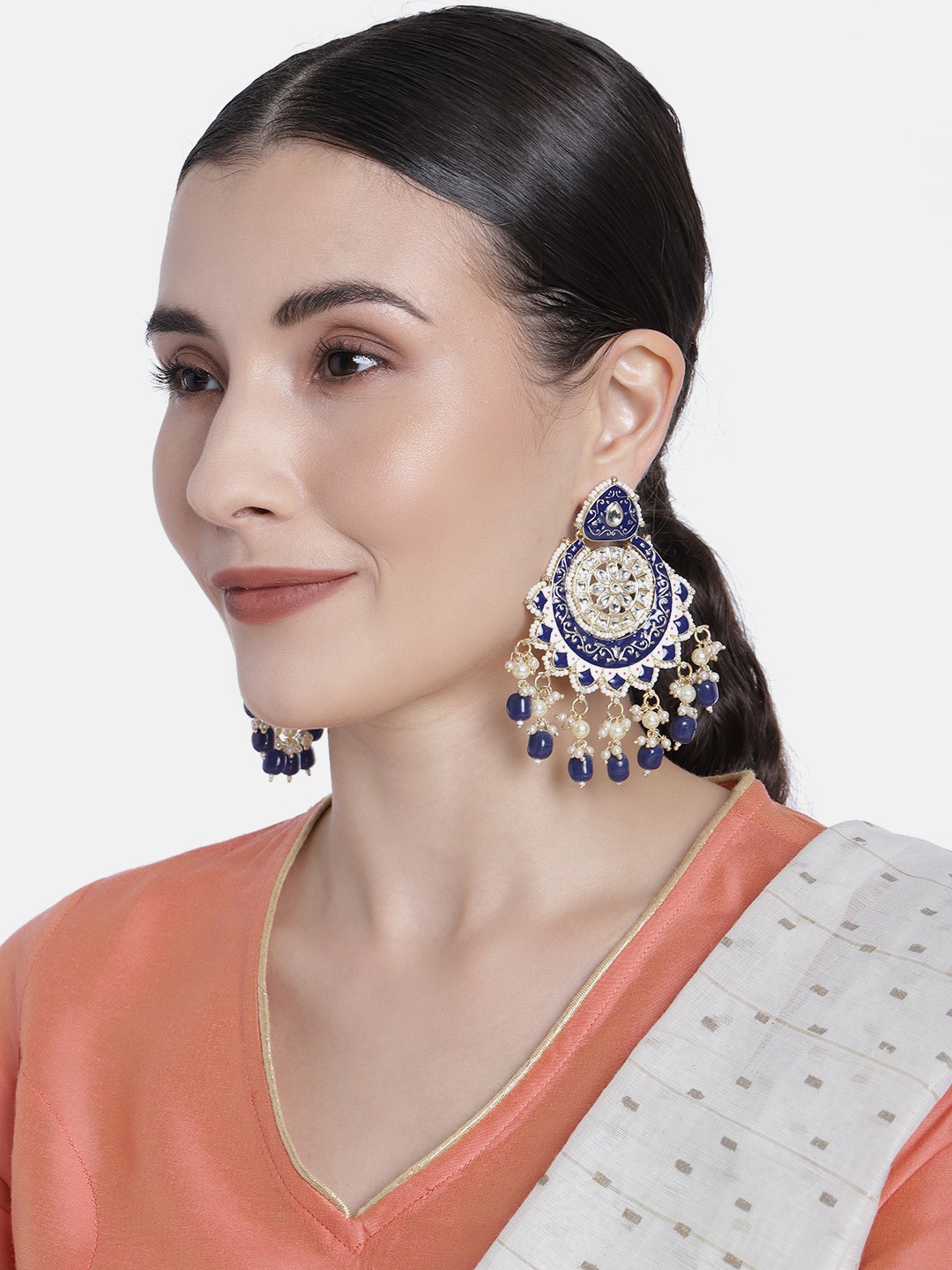 

Peora Blue & White Gold Plated Crescent Shaped Enamelled Chandbalis
