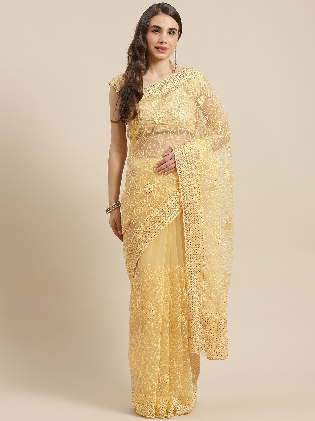

Chhabra 555 Yellow & Gold-Toned Floral Beads and Stones Net Saree