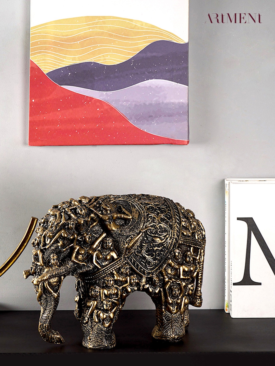 

THE ARTMENT Gold-Toned Carved Elephant Table Accent Showpiece