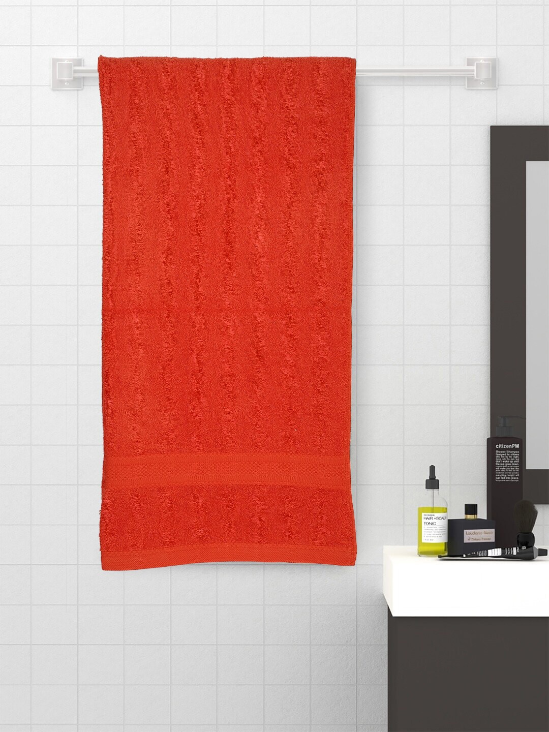 

Raymond Home Orange Solid Cotton 450 GSM Bath Towel