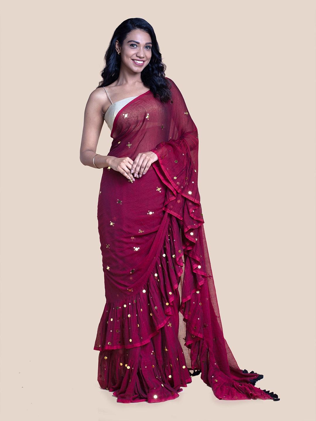 

Suta Maroon & Gold-Toned Embellished Sequinned Pure Cotton ruffle Saree