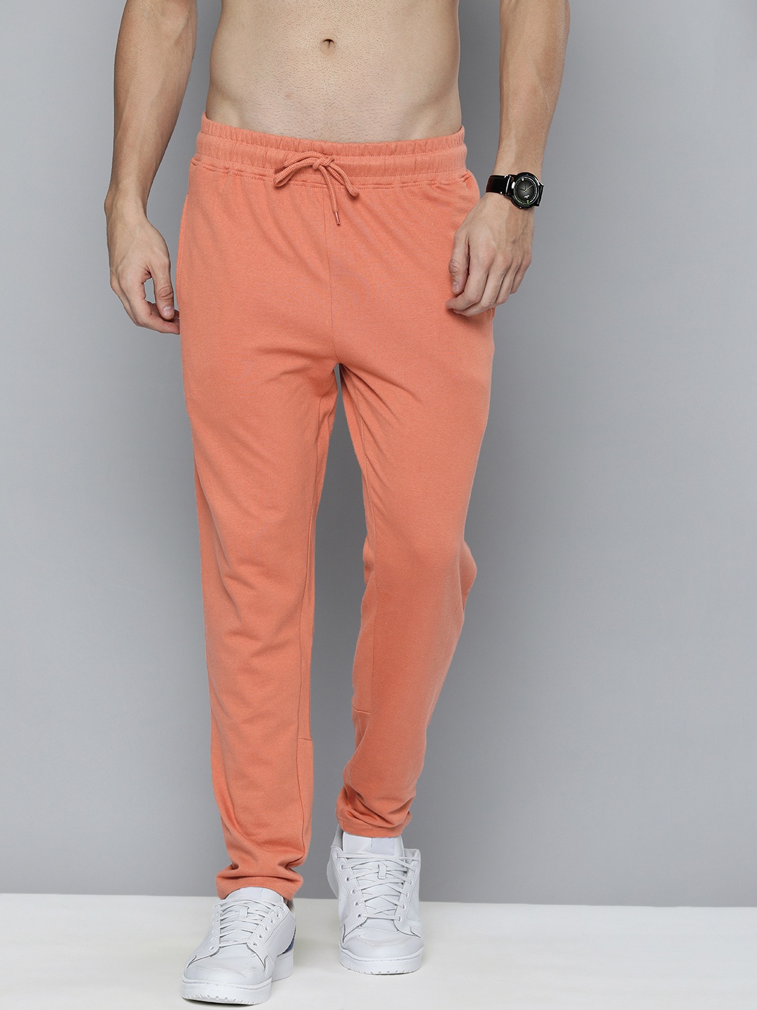 

HERE&NOW Men Orange Solid Track Pants