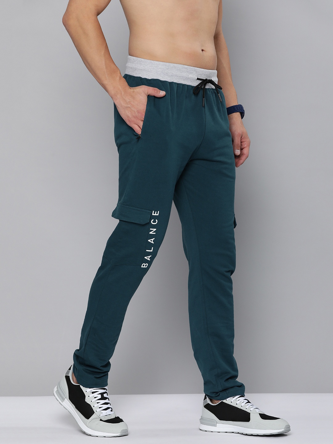 

HERE&NOW Men Teal Blue Printed Straight Fit Pure Cotton Track Pants With Side Stripes