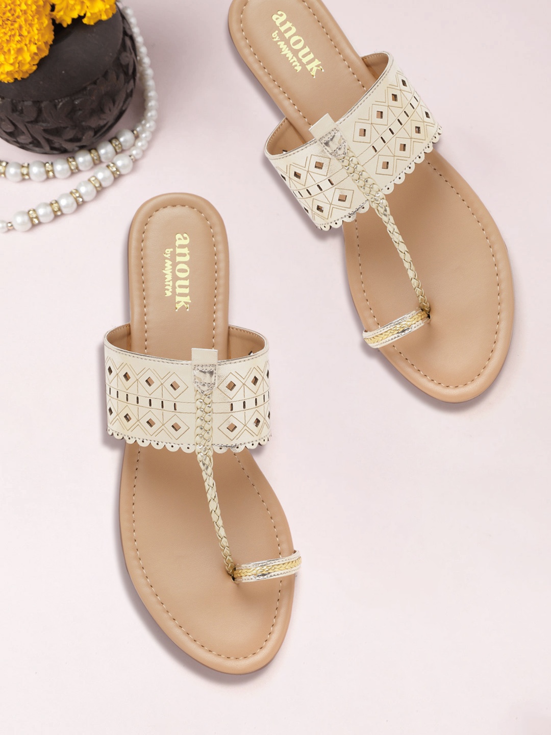 

Anouk Women Gold-Toned Laser Cuts Textured One Toe Flats