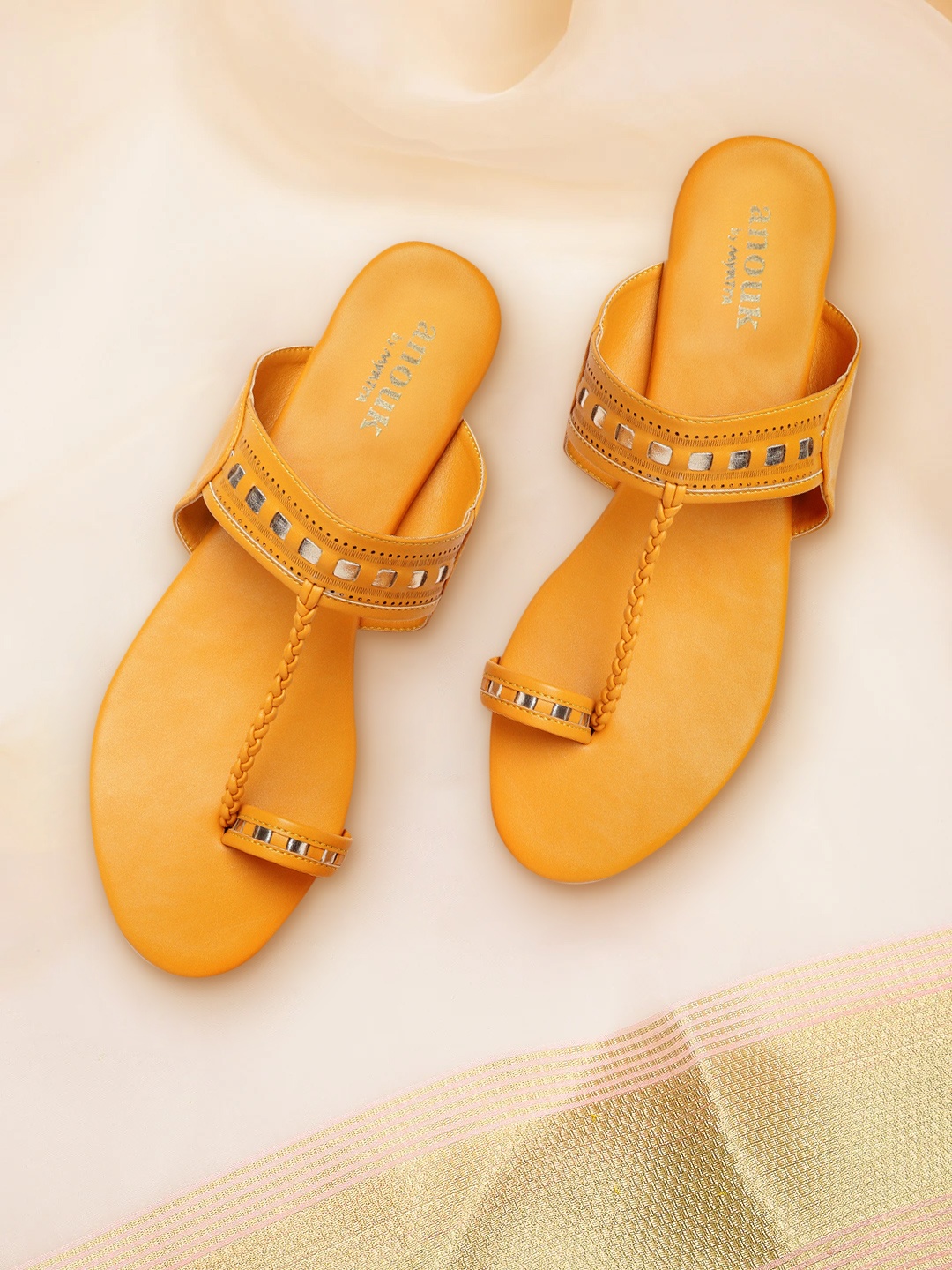 

Anouk Women Mustard Solid Braided Design One Toe Flats