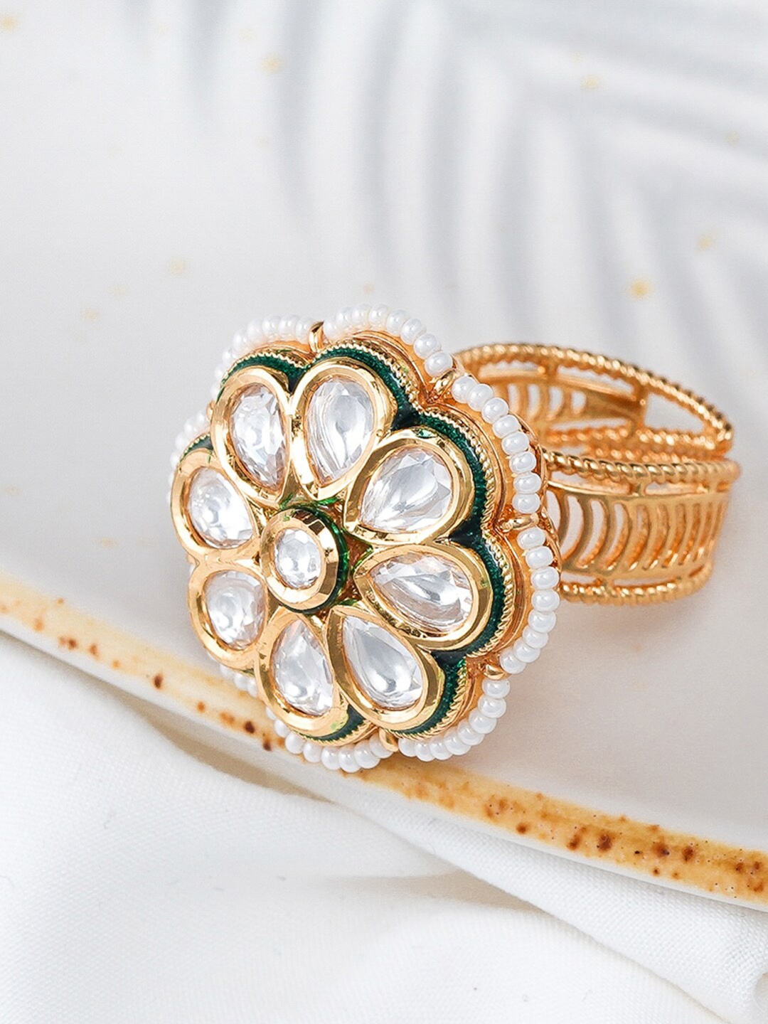

Queen Be Gold Toned & White Stone Studded Adjustable Finger Ring