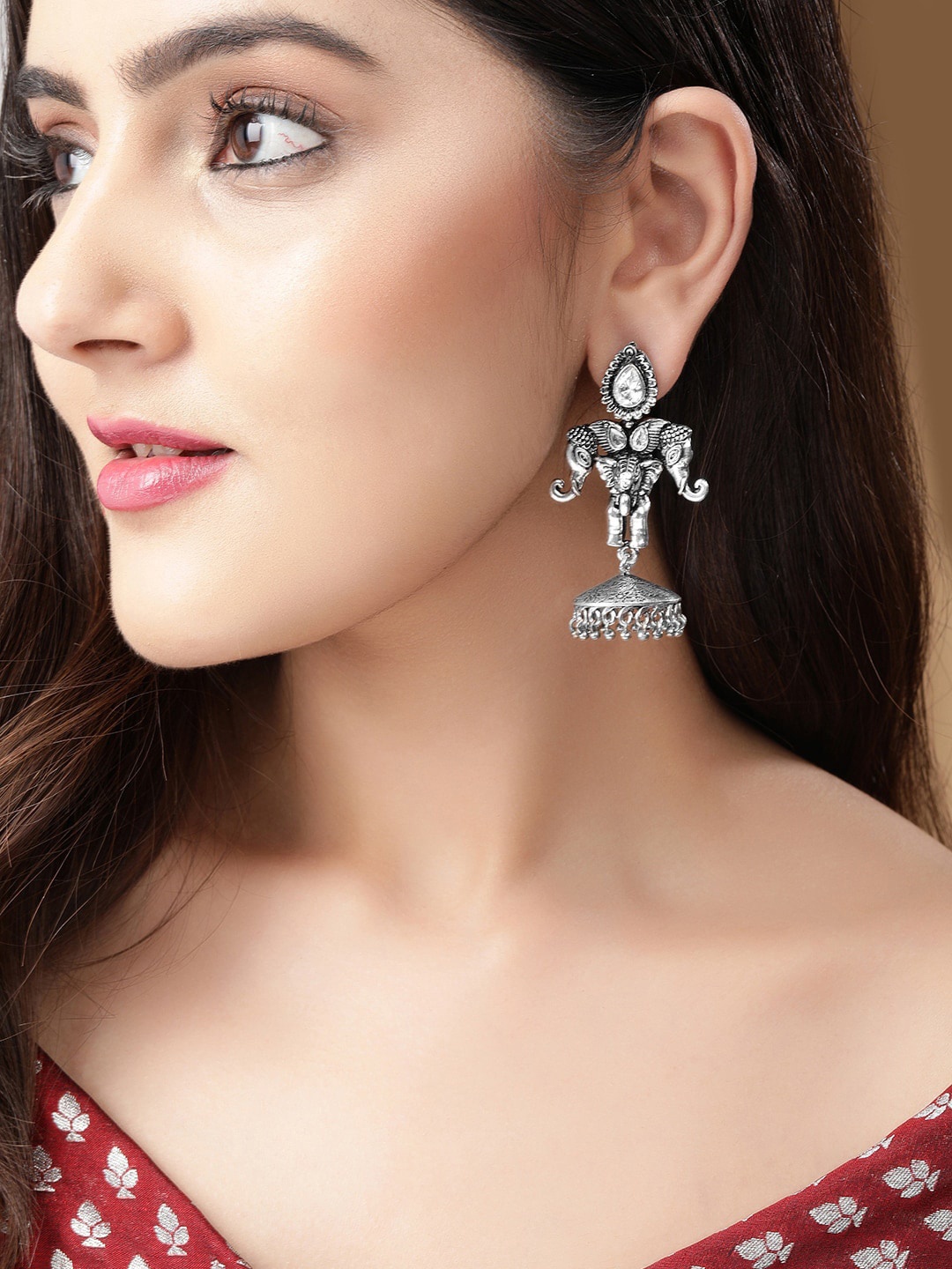 

Rubans Silver-Toned Dome Shaped Jhumkas Earrings