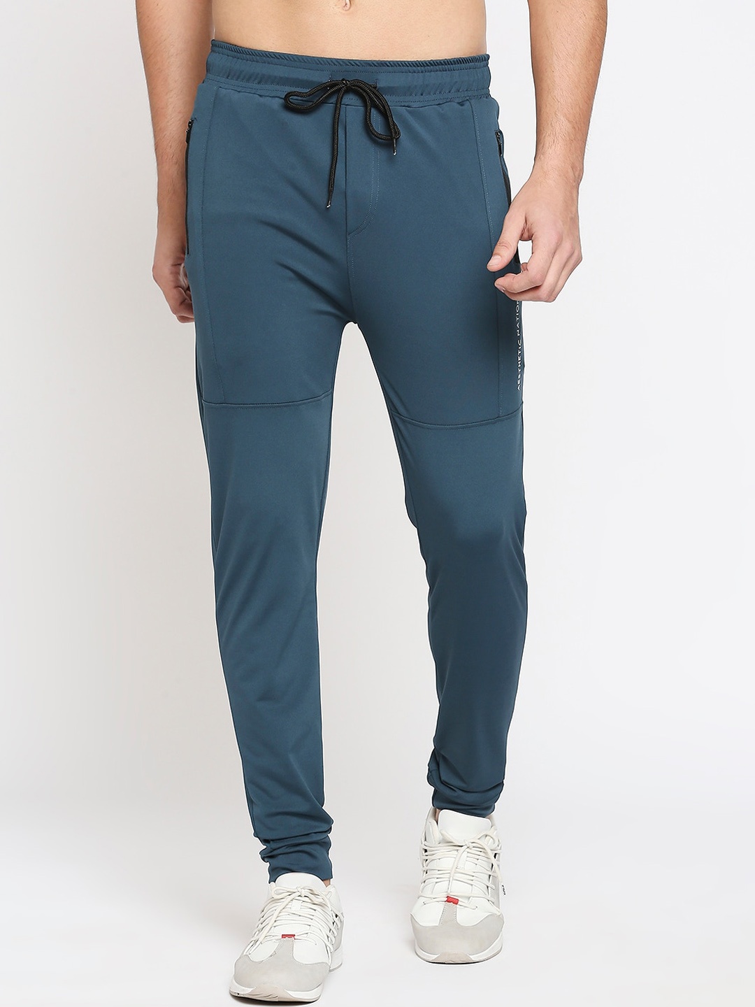 

AESTHETIC NATION Men Blue Solid Track Pants