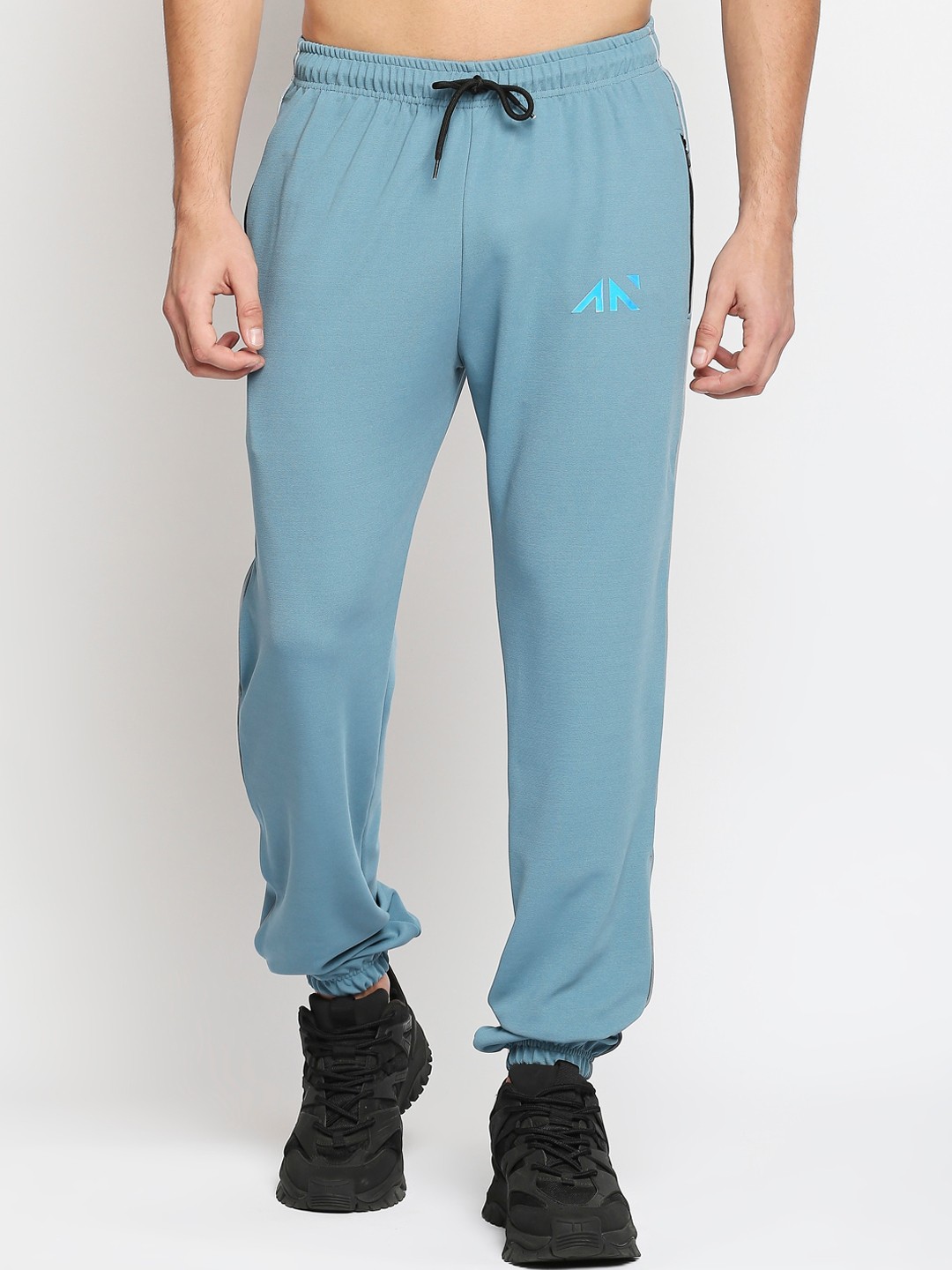 

AESTHETIC NATION Men Blue Solid Joggers