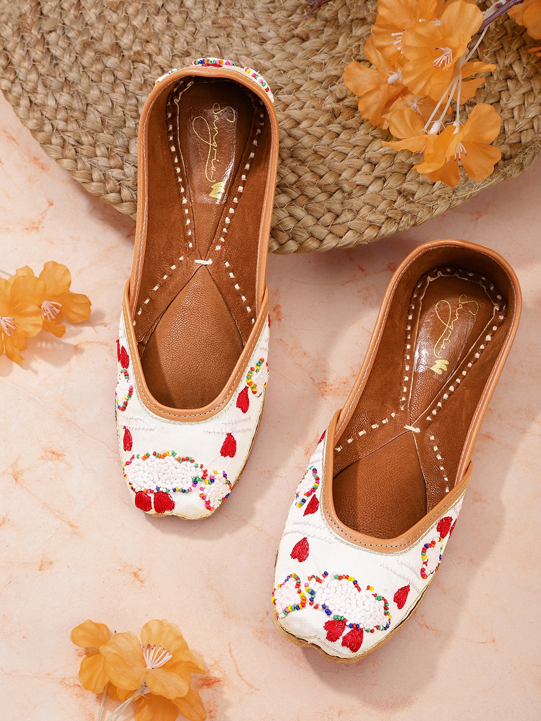 

Sangria Women White & Red Ethnic Embellished Handcrafted Mojaris