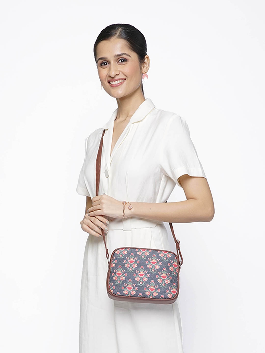 

ZOUK Navy Blue Floral Printed Structured Sling Bag with Tasselled