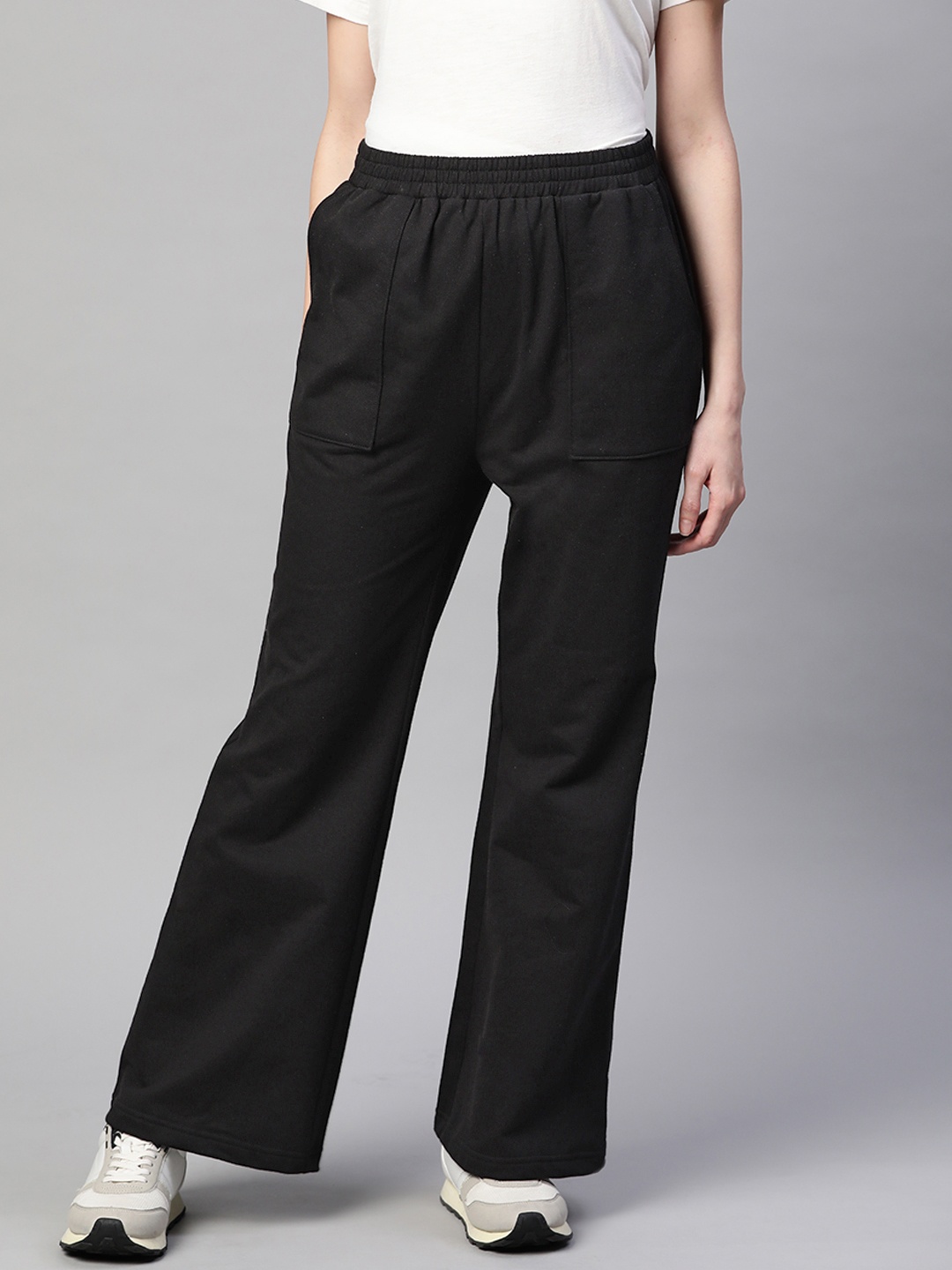 

Laabha Womens Black Solid Mid Rise Flared Track Pants