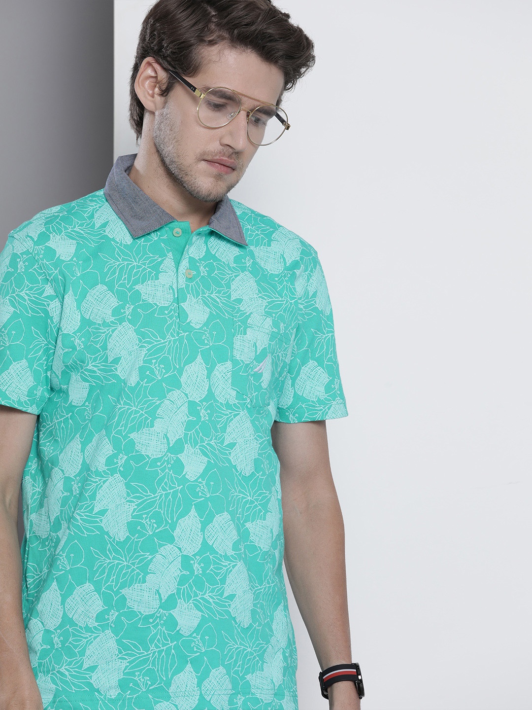 

Nautica Men Sea Green & White Floral Printed Polo Collar Pure Cotton T-shirt