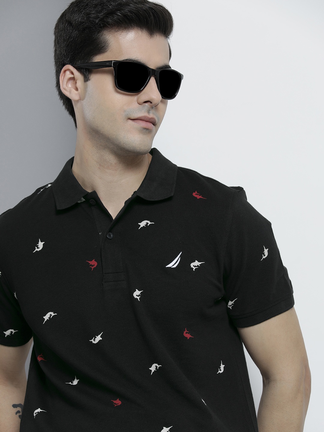 

Nautica Men Black & Multicoloured Printed Polo Collar Slim Fit Pure Cotton Casual T-shirt