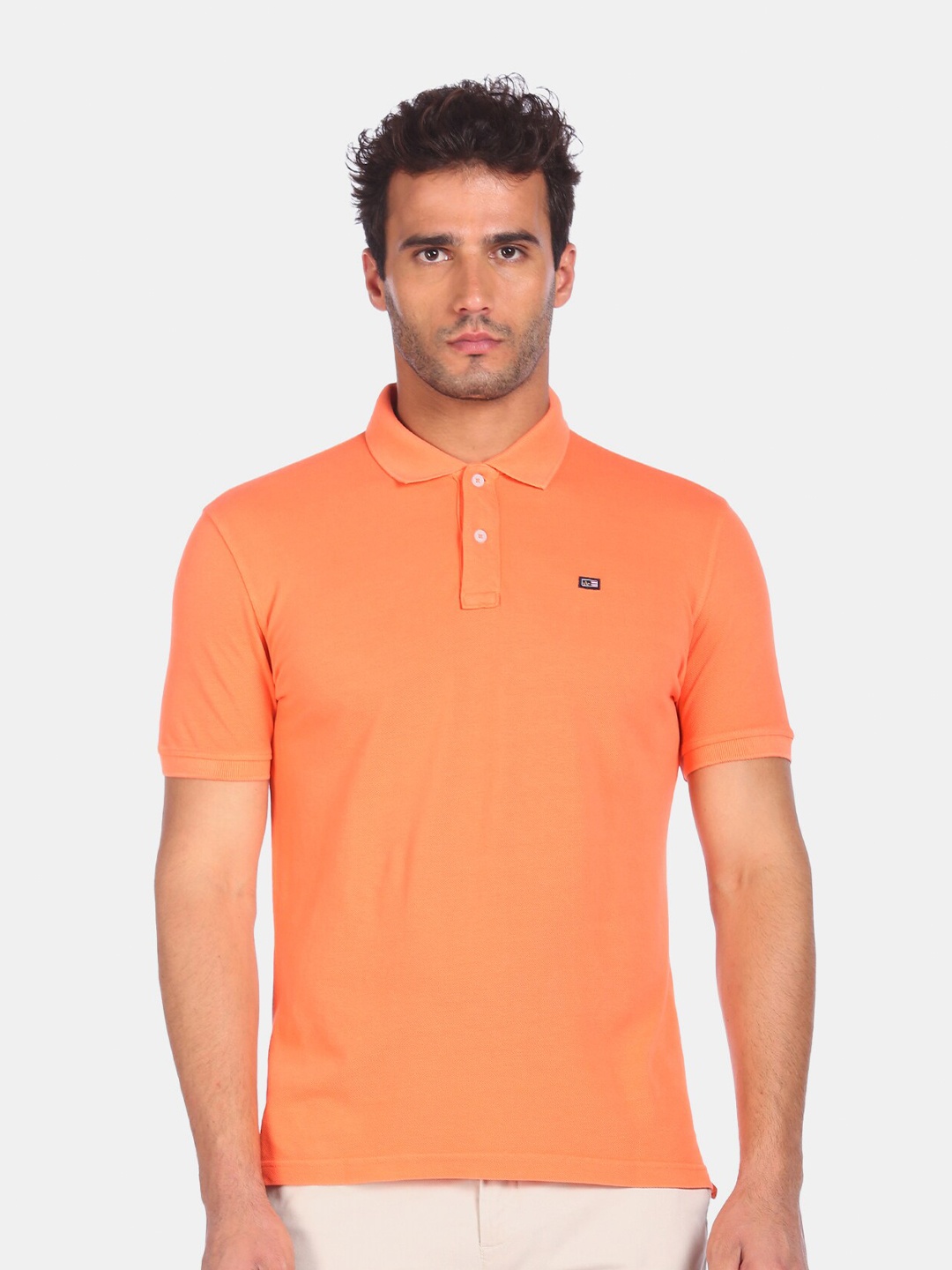 

Arrow Sport Men Orange Polo Collar Cotton T-shirt