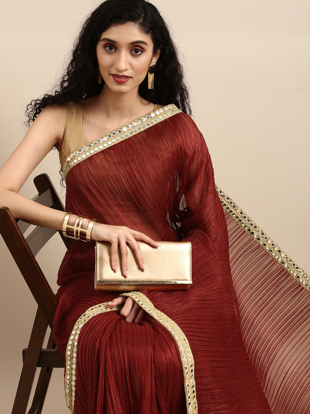 

Anouk Maroon Mirror Work Solid Polyester Bhagalpuri Saree with Pleated Detail