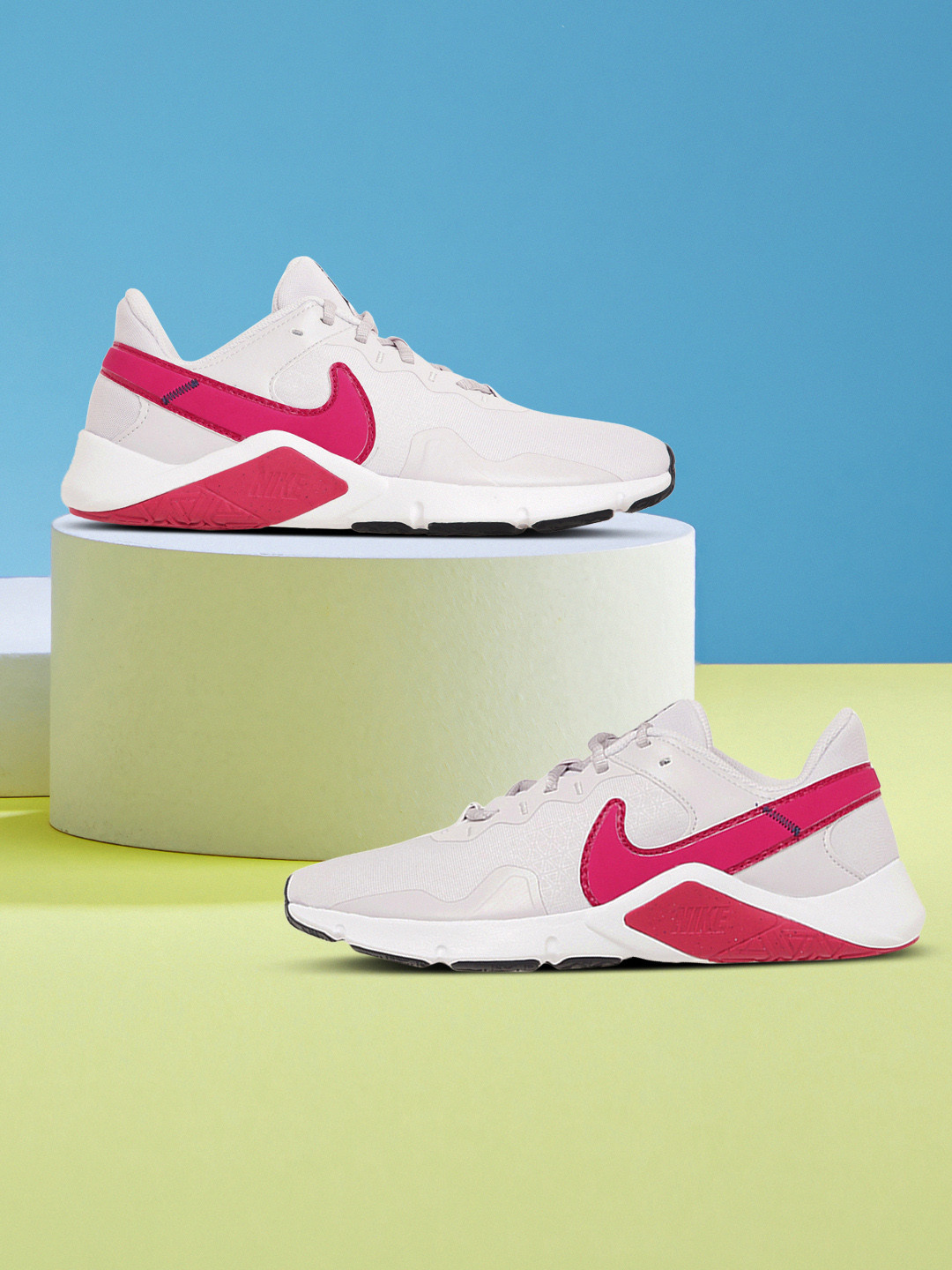 

Nike Women Off White & Pink Legend Essential 2 Training Shoes