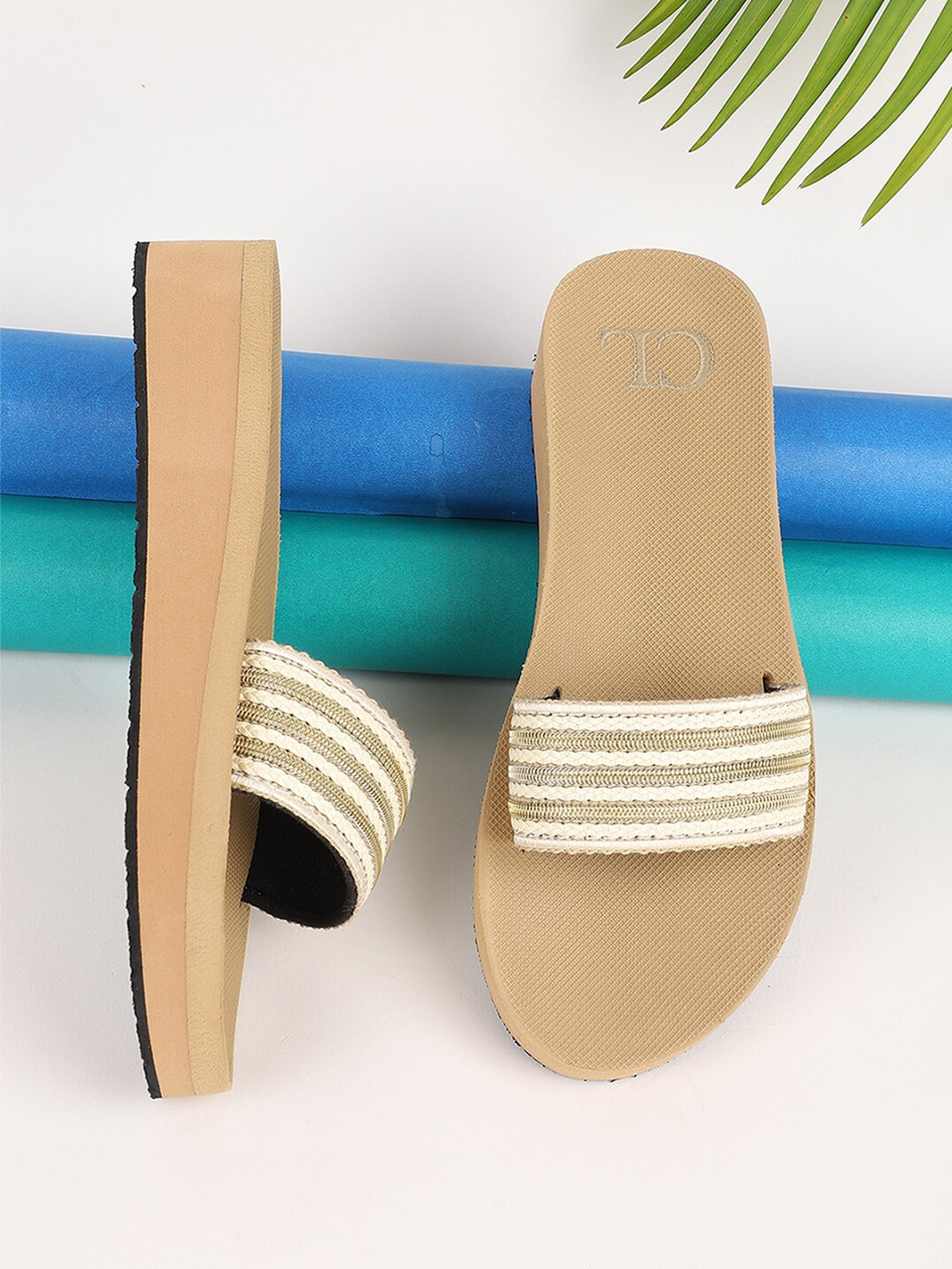 

Carlton London Women Beige & White Striped Rubber Sliders