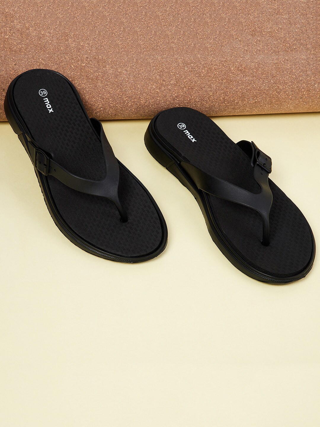 

max Women Black Rubber Thong Flip-Flops