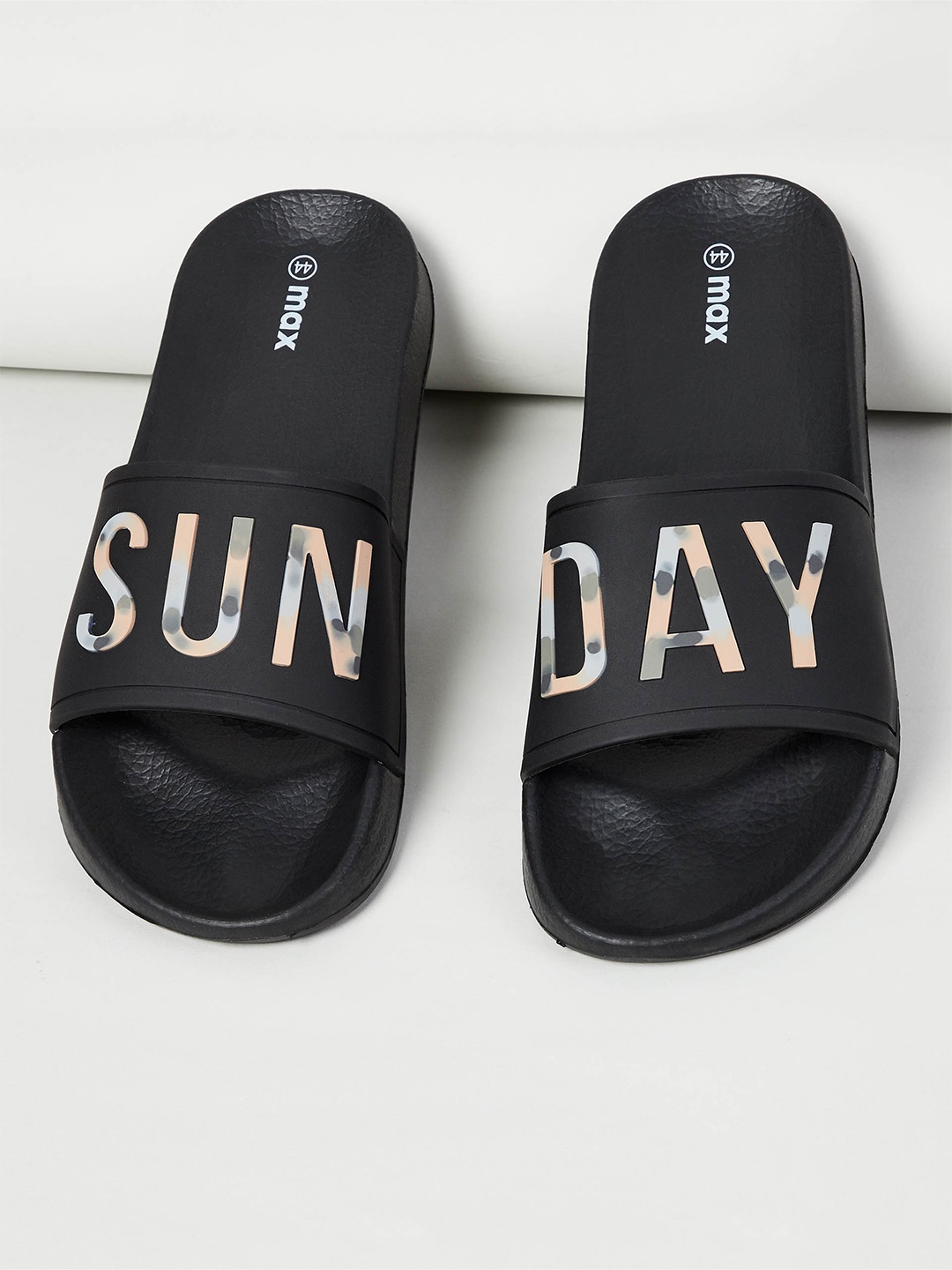 

max Women Black Printed Rubber Sliders