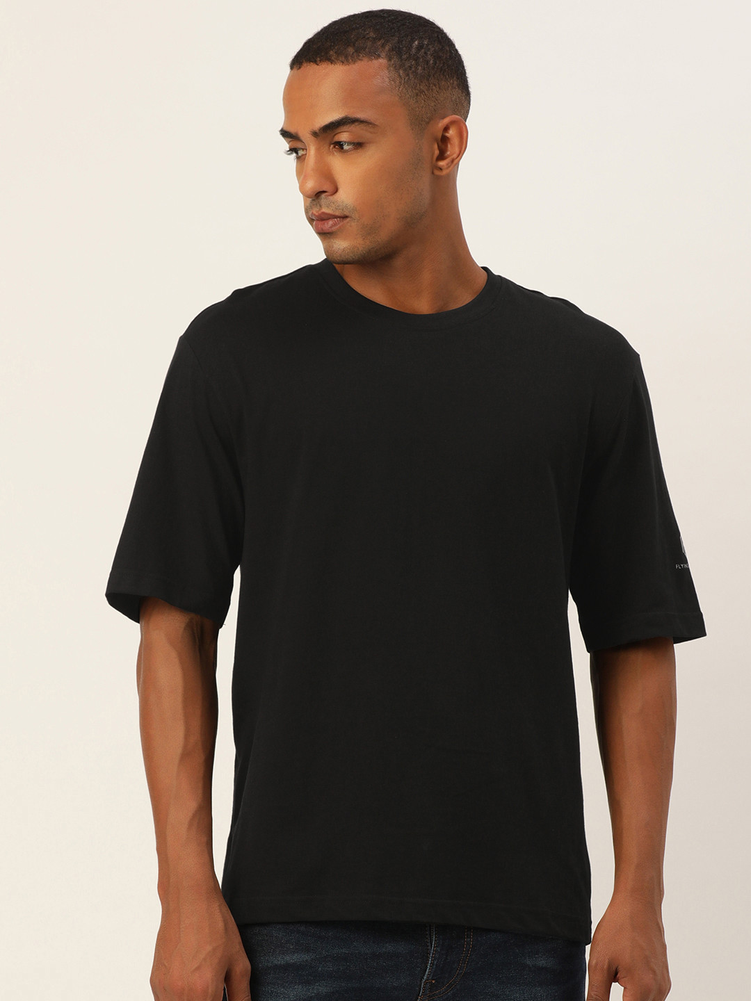

Flying Machine Men Black Solid Drop-Shoulder Sleeves Pure Cotton Round Neck T-shirt