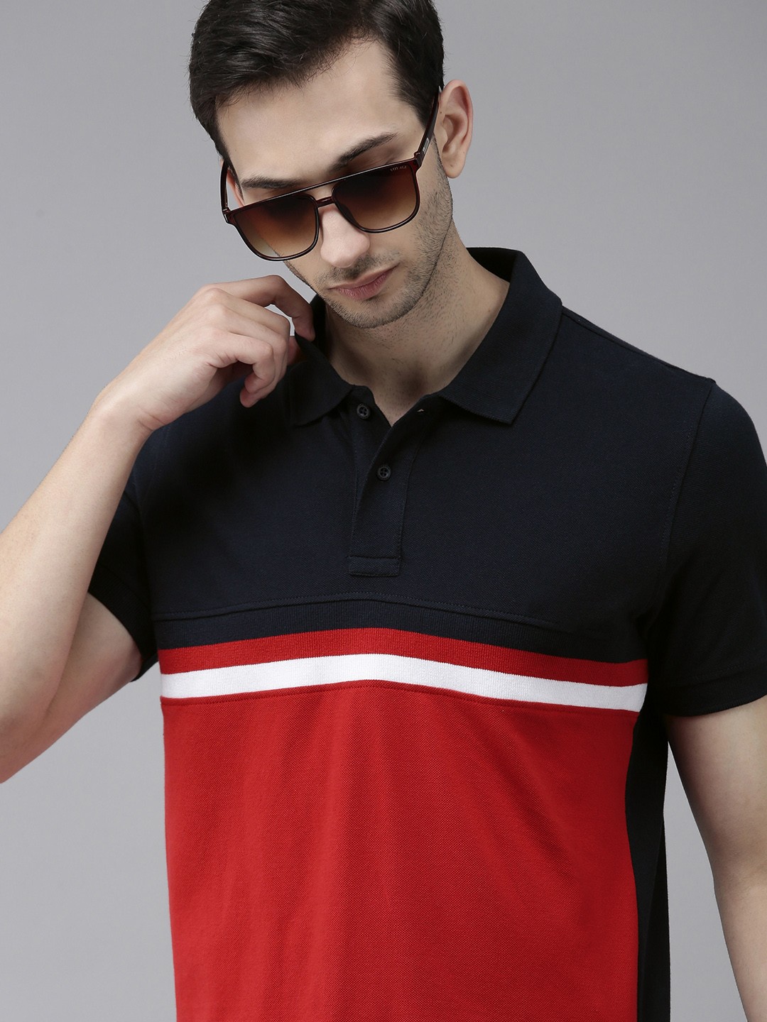 

Arrow Sport Men Red & Navy Blue Colourblocked Pure Cotton Polo Collar T-shirt