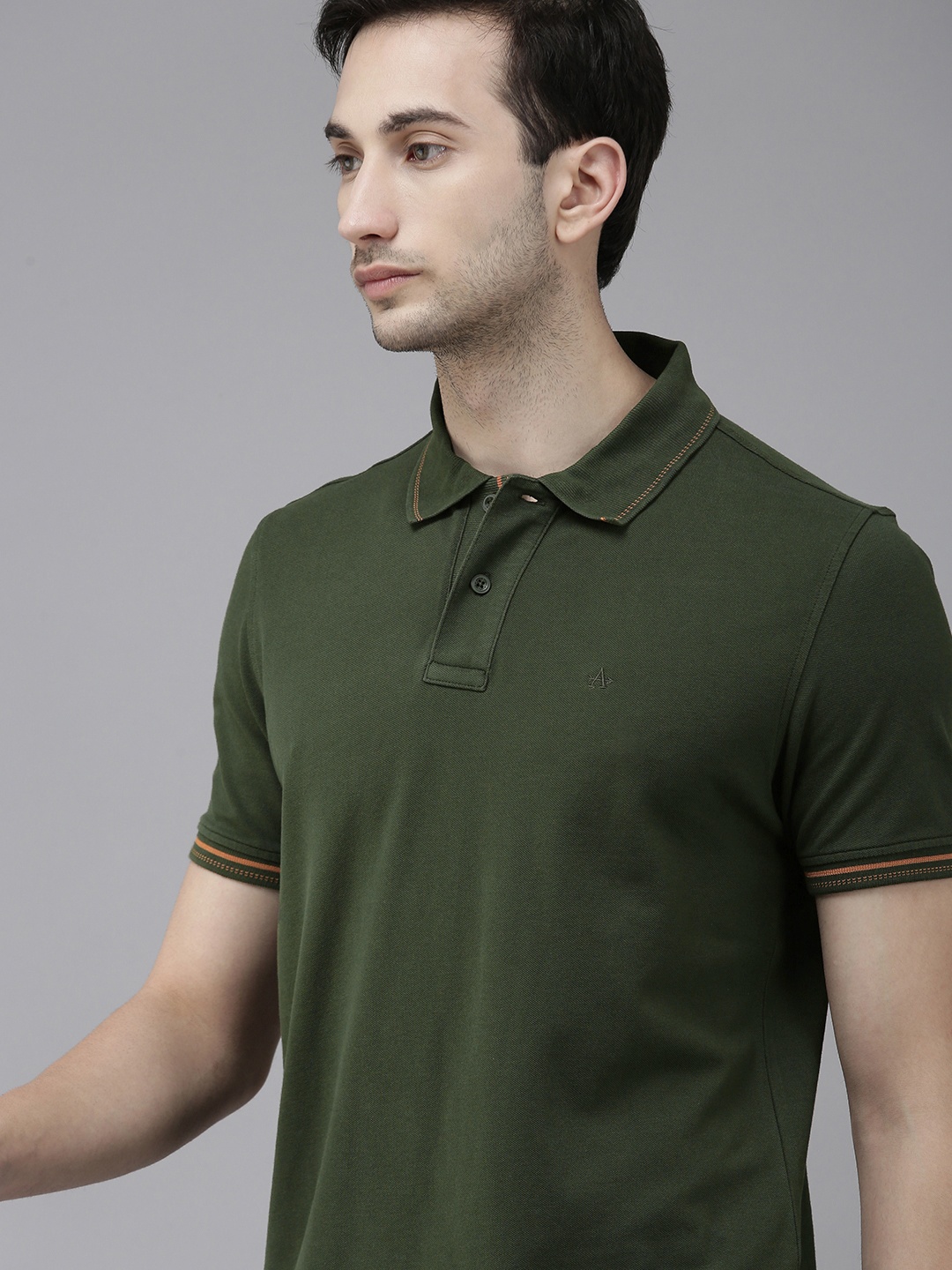 

Arrow Sport Men Green Solid Polo Collar T-shirt