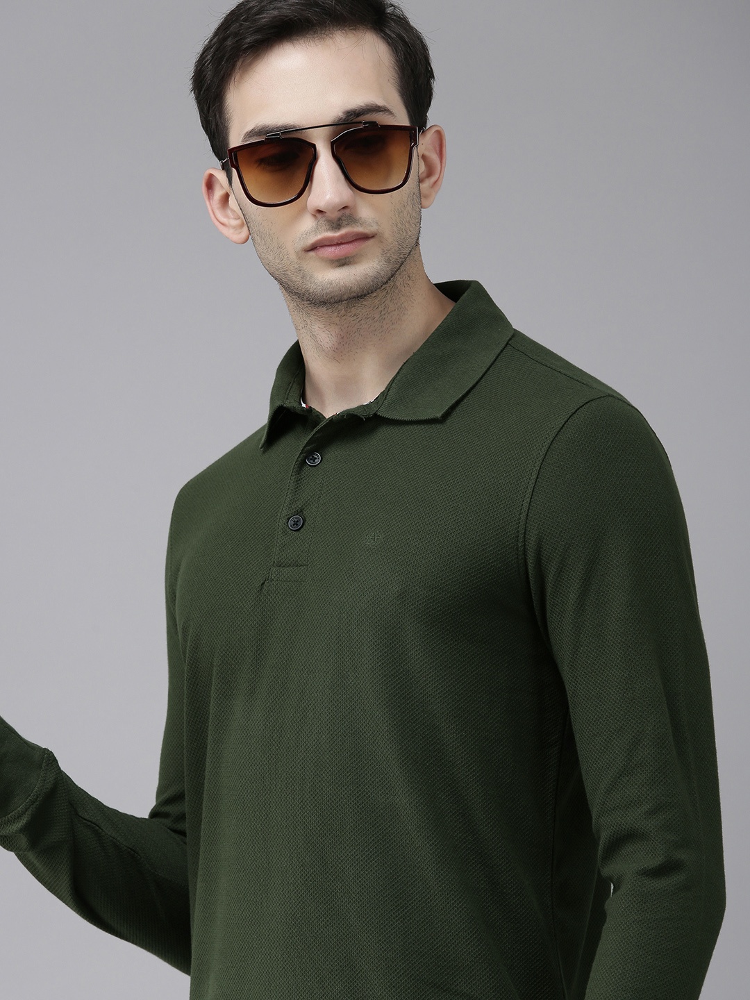 

Arrow Sport Men Green Self Design Polo Collar T-shirt