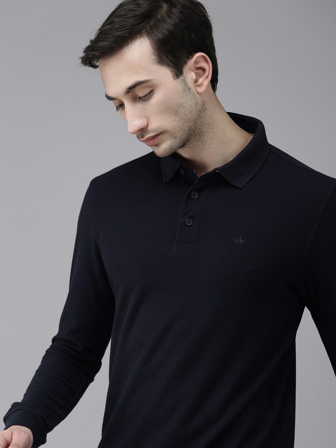 

Arrow Sport Men Navy Blue Self-Design Pure Cotton Polo Collar T-shirt