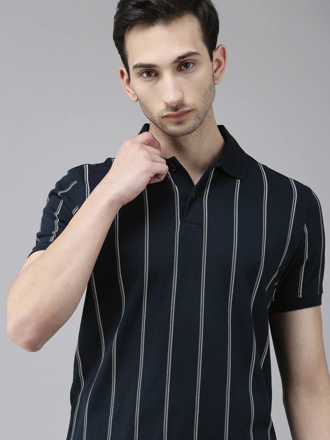 

Arrow Sport Men Navy Blue Striped Pure Cotton Polo Collar T-shirt