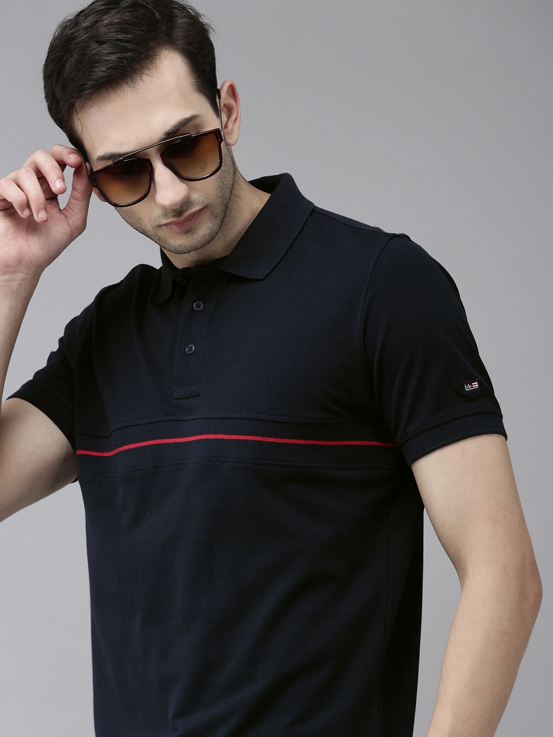

Arrow Sport Men Navy Blue Solid Pure Cotton Polo Collar T-shirt