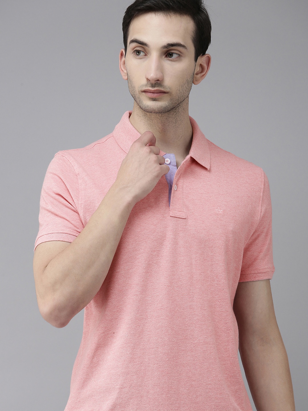 

Arrow Sport Men Pink Solid Polo Collar T-shirt