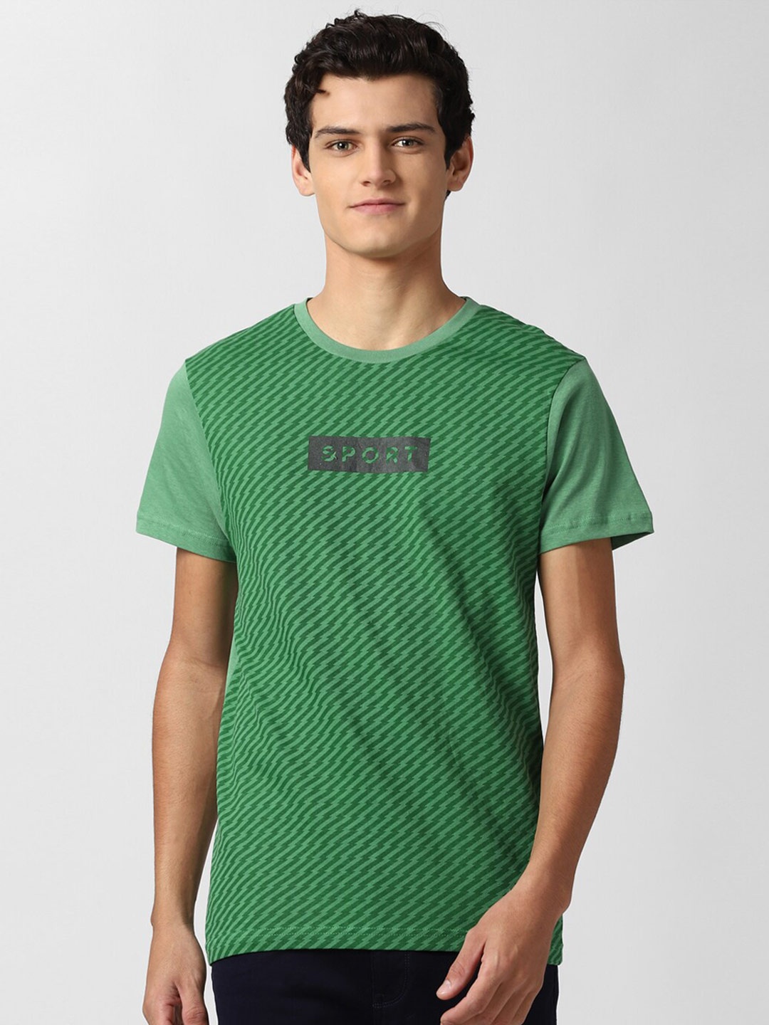 

Peter England Casuals Men Green Printed Slim Fit Pure Cotton T-shirt